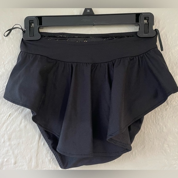 Black bikini bottom flouncy skirt with gold details along wide waist line;size M - Picture 3 of 4